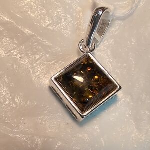 Elegant Sterling Silver and Amber Pendant